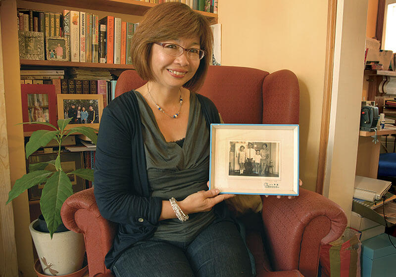 01.	Ms. Christina Mei Yong Chow with her treasured family photo