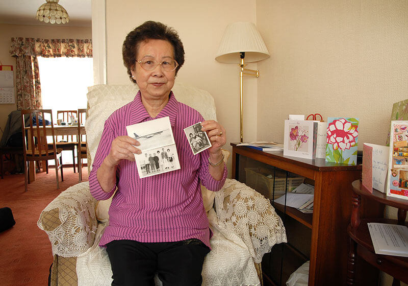 Fung Yiu Lee with her treasured old family photos